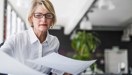 woman reviewing documents