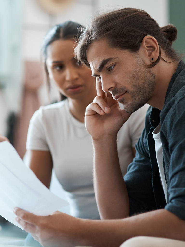 Couple discussing debt.