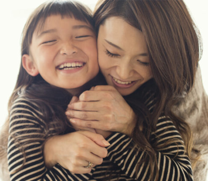 Mother and Daughter Laughing